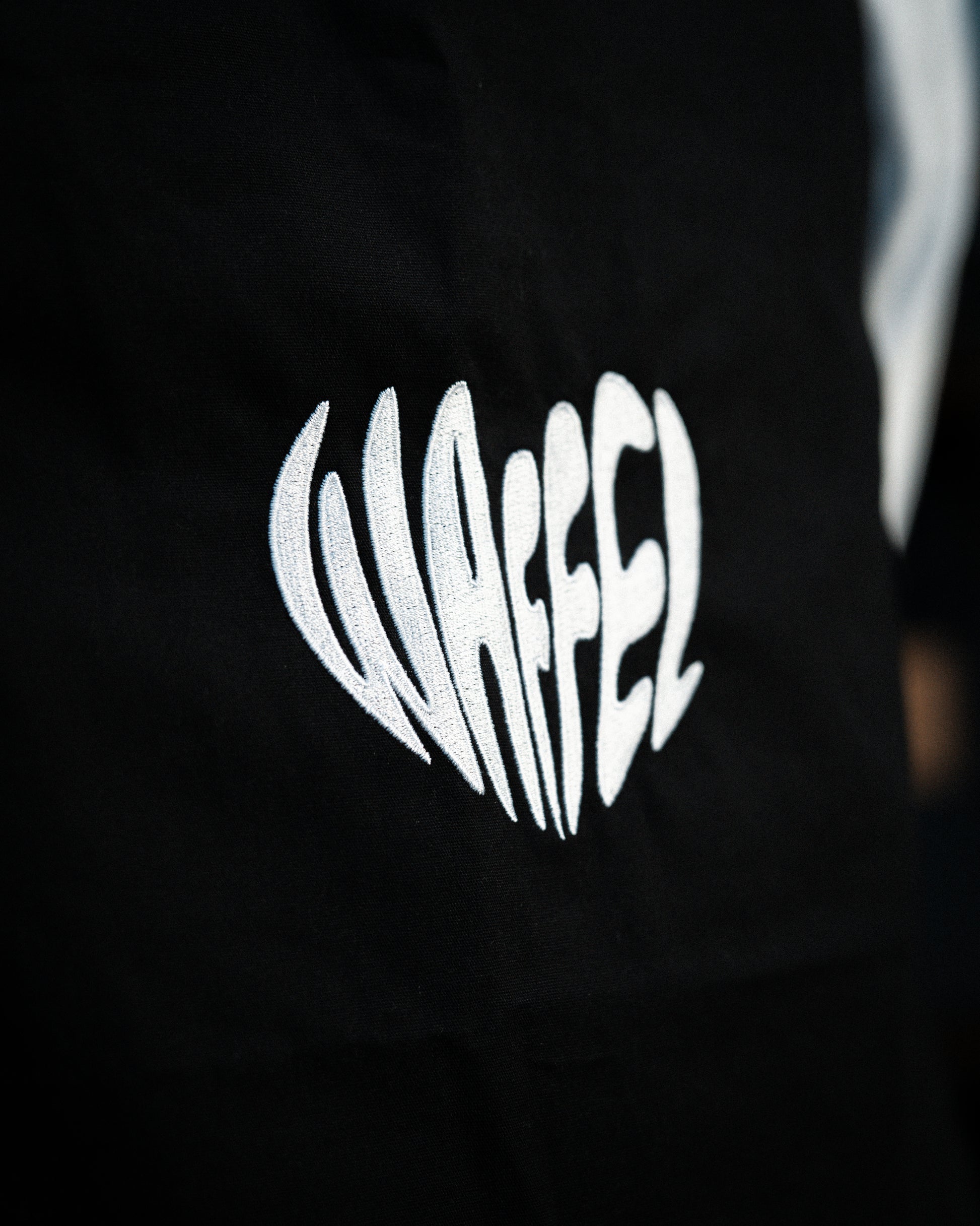 WAFFEL HERZ STICK SCHÜRZE SCHWARZ